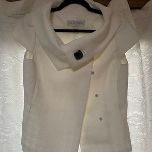 Women's off white collared vest with black button